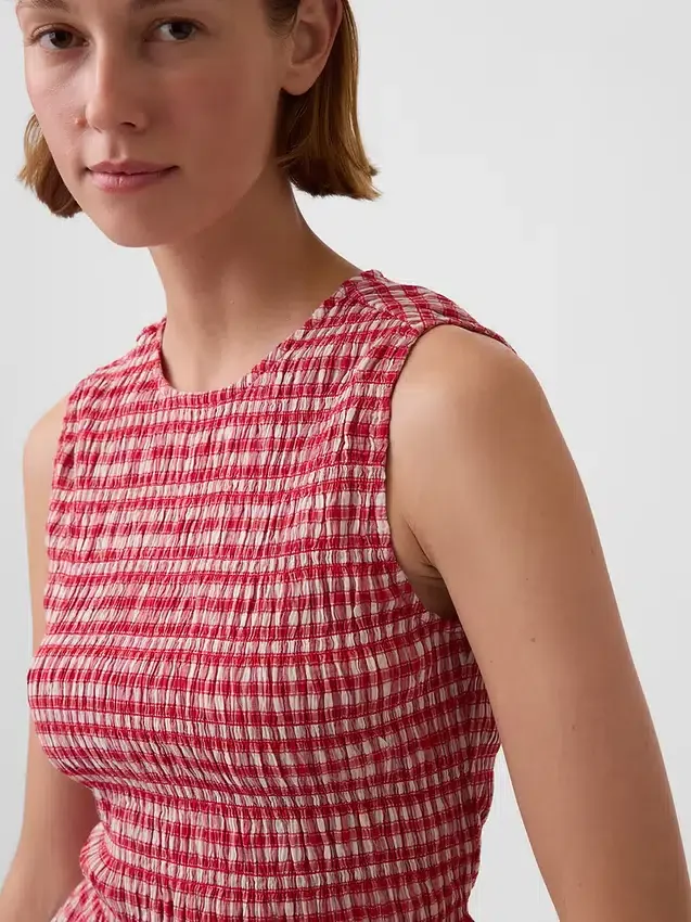 Gesmokte peplumtop met ginghamprint