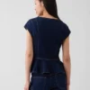 Getailleerde denim top met kapmouwtjes en peplum