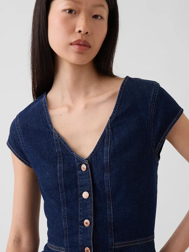 Getailleerde denim top met kapmouwtjes en peplum