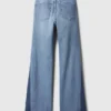 Hoge taille, gepatchte flare-Jeans in jaren ’70-stijl