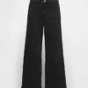 Jeans met hoge taille, wijde pijpen en enkellengte