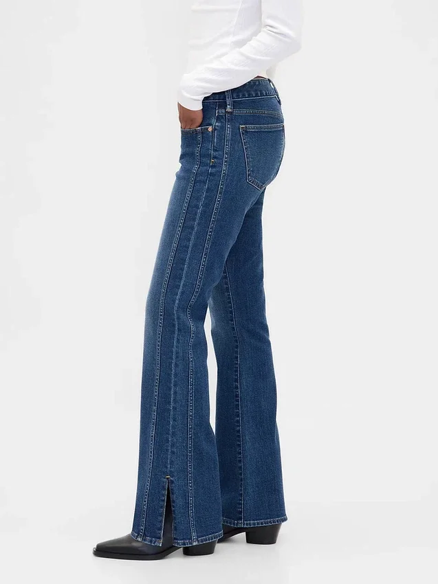 Jeans met lage taille, lang en slank model, met naad en gespleten zoom