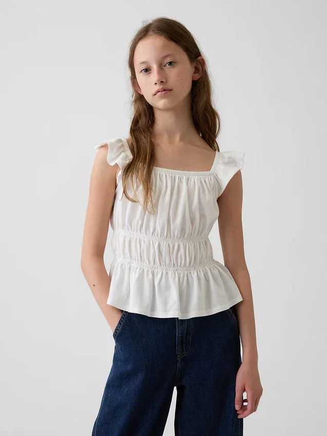 Kinder-top met fladdermouwen, smockwerk en peplum