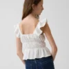 Kinder-top met fladdermouwen, smockwerk en peplum