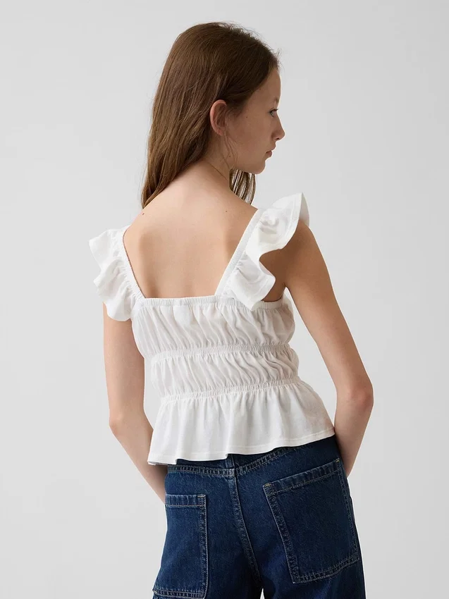 Kinder-top met fladdermouwen, smockwerk en peplum