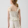Kinder-top van katoenen gaas met smockwerk en peplum