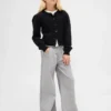 Kinderbaggy-Jeans met lage taille, strik en gespleten zoom