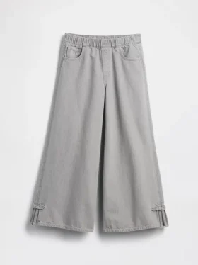Kinderbaggy-Jeans met lage taille, strik en gespleten zoom