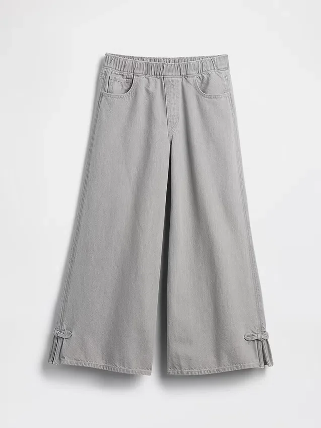 Kinderbaggy-Jeans met lage taille, strik en gespleten zoom