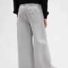 Kinderbaggy-Jeans met lage taille, strik en gespleten zoom
