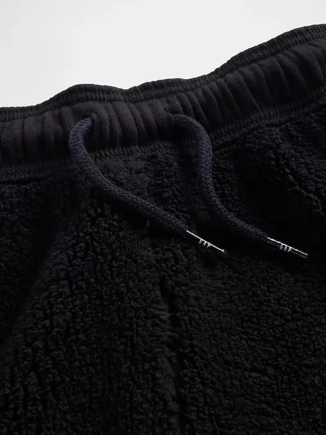 Kinderen: Joggingbroek met relaxte pasvorm en sherpa-voering