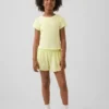 Kinderen: Sneldrogende korte broek met vlinderzoom