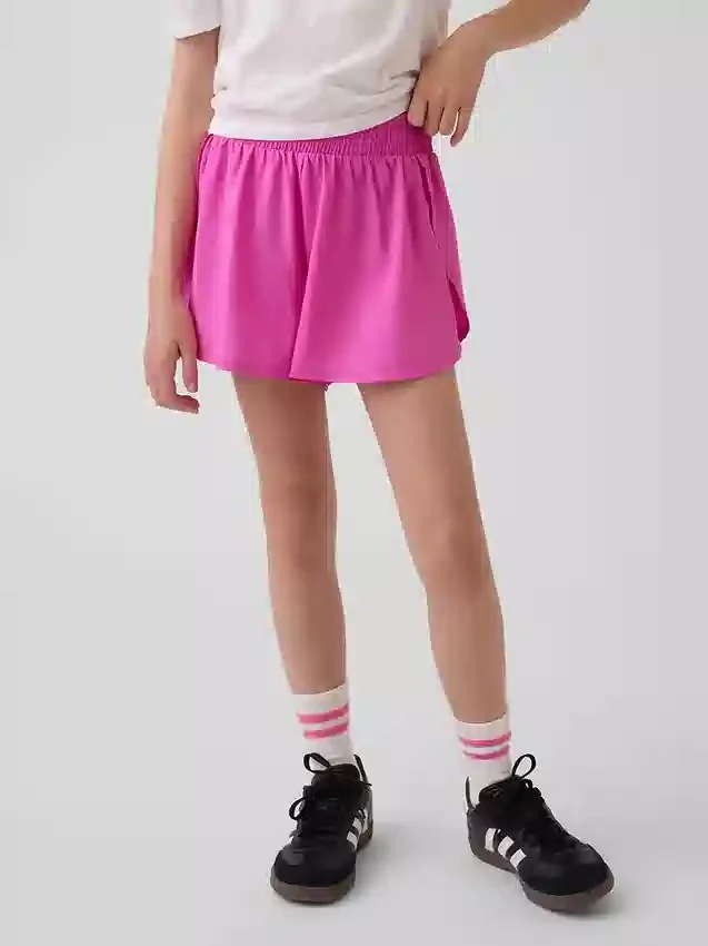 Kinderen: Sneldrogende korte broek met vlinderzoom