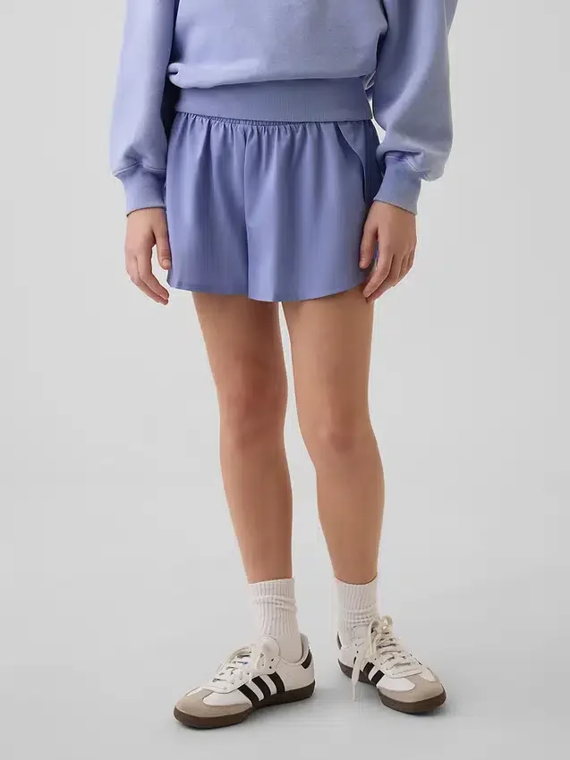 Kinderen: Sneldrogende korte broek met vlinderzoom