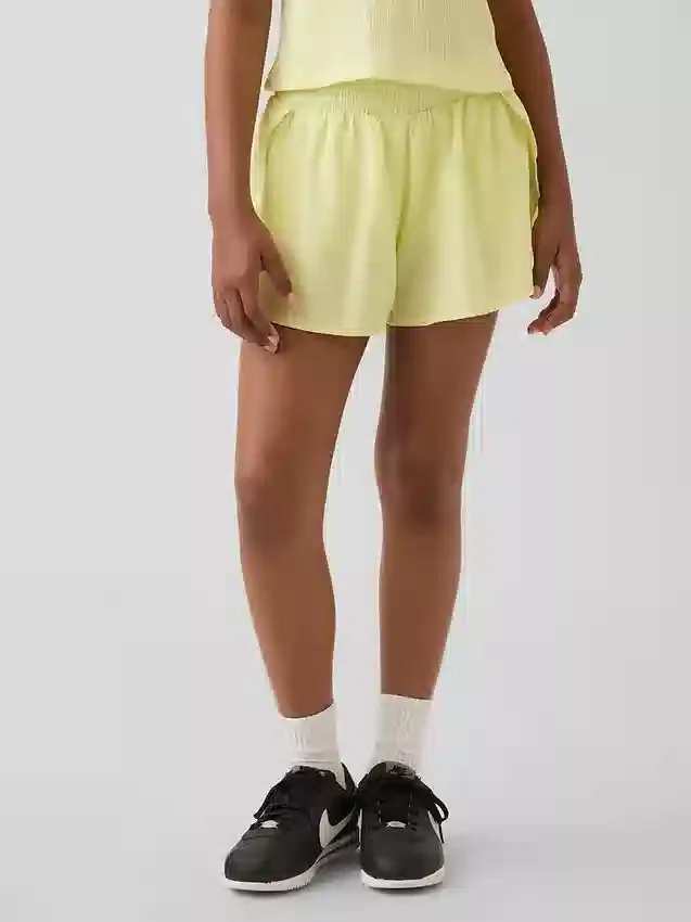 Kinderen: Sneldrogende korte broek met vlinderzoom