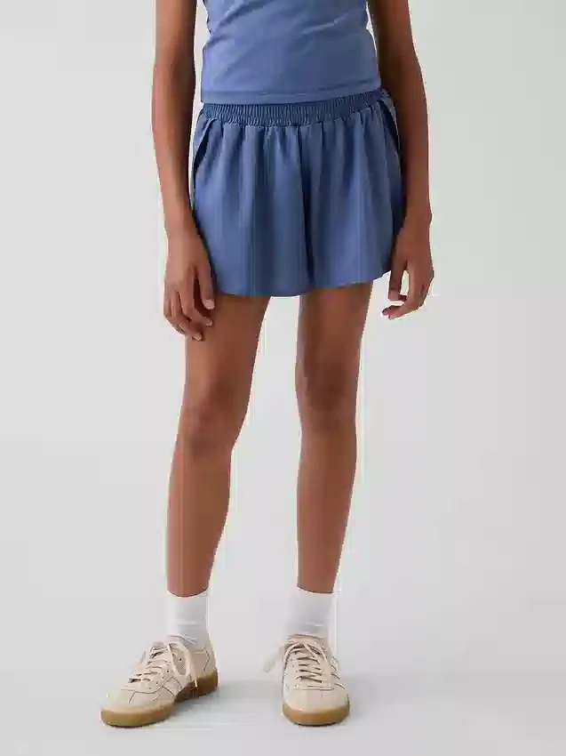 Kinderen: Sneldrogende korte broek met vlinderzoom
