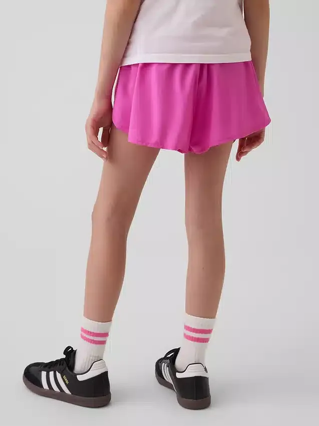 Kinderen: Sneldrogende korte broek met vlinderzoom
