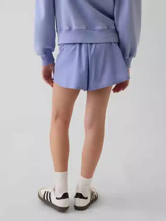 Kinderen: Sneldrogende korte broek met vlinderzoom