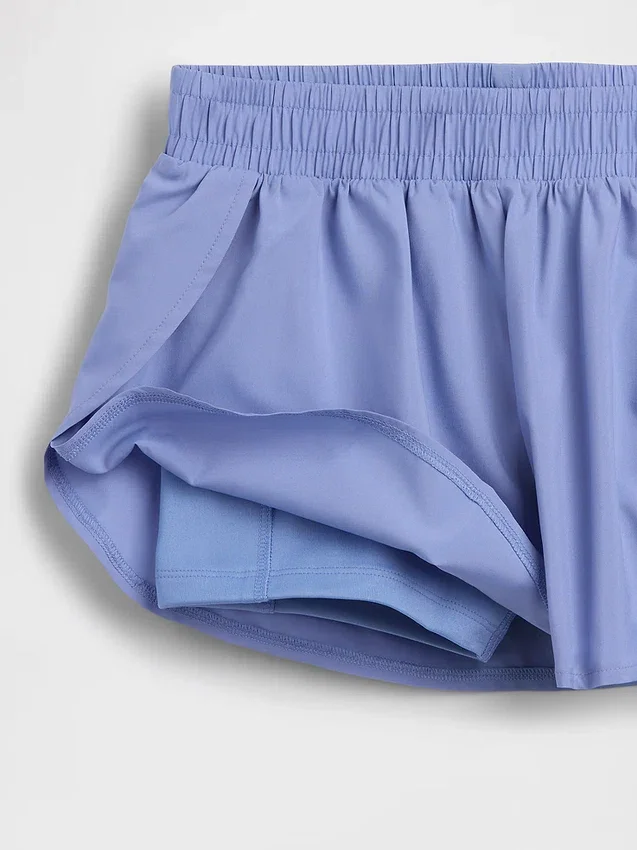 Kinderen: Sneldrogende korte broek met vlinderzoom
