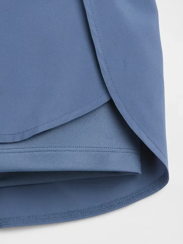 Kinderen: Sneldrogende korte broek met vlinderzoom