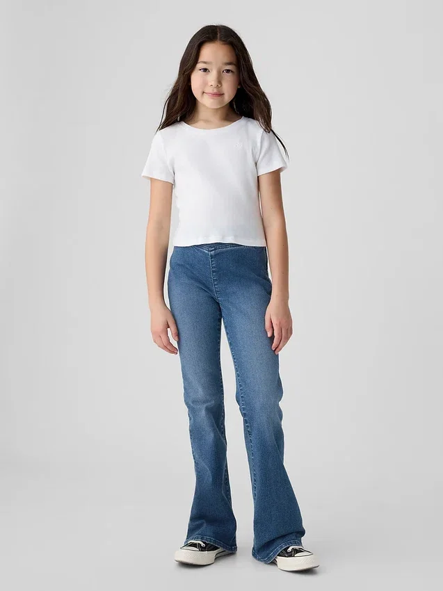 Kinderjeans met hoge taille en gekruiste banden