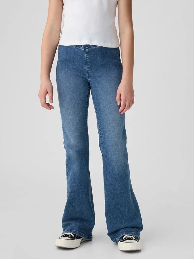 Kinderjeans met hoge taille en gekruiste banden