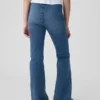 Kinderjeans met hoge taille en gekruiste banden