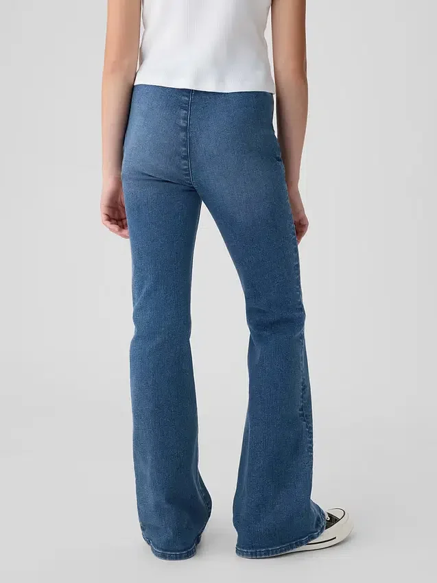 Kinderjeans met hoge taille en gekruiste banden