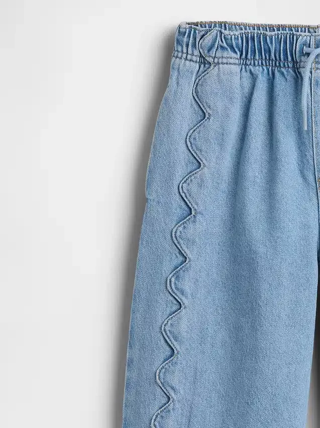 Kinderjeans met hoge taille, ruime pijpen en enkellengte