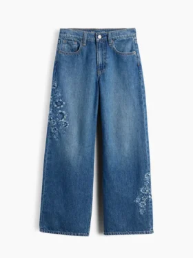 Kinderjeans met lage taille, brede pijpen en geborduurde bloemen