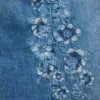 Kinderjeans met lage taille, brede pijpen en geborduurde bloemen