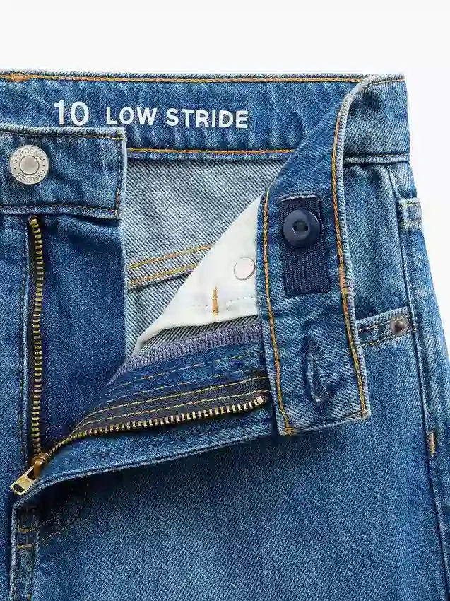 Kinderjeans met lage taille, brede pijpen en geborduurde bloemen