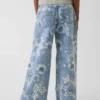 Kinderjeans met lage taille en bloemenprint