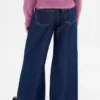 Kinderjeans met lage taille, losse pasvorm en metallic effect