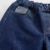 Kinderjeans met lage taille, losse pasvorm en metallic effect
