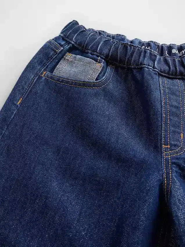 Kinderjeans met lage taille, losse pasvorm en metallic effect