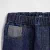 Kinderjeans met lage taille, losse pasvorm en metallic effect