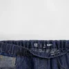 Kinderjeans met lage taille, losse pasvorm en metallic effect