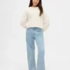 Kinderjeans met lage taille, strikjes en wijde pijpen