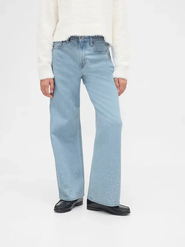 Kinderjeans met lage taille, strikjes en wijde pijpen