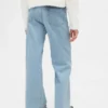 Kinderjeans met lage taille, strikjes en wijde pijpen