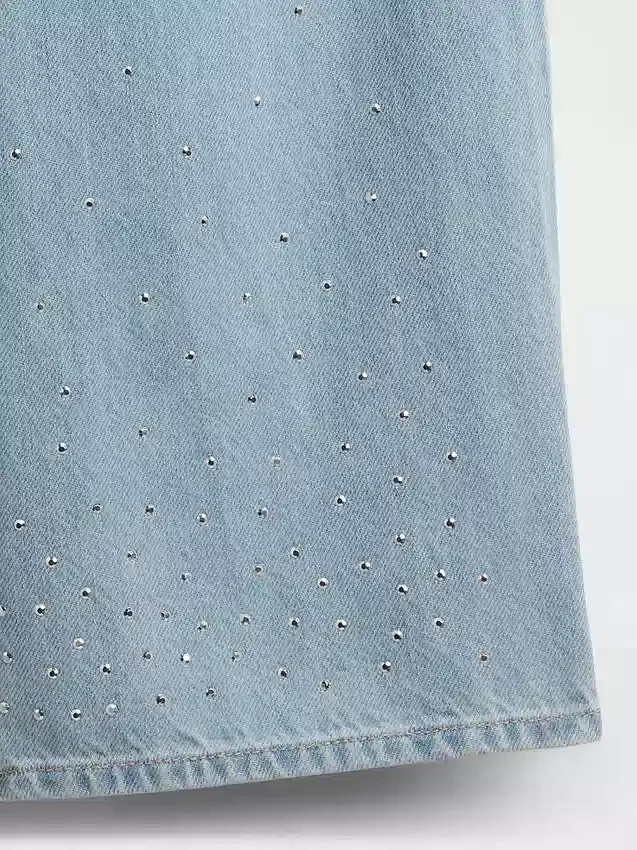 Kinderjeans met lage taille, strikjes en wijde pijpen