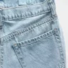 Kinderjeans met lage taille, strikjes en wijde pijpen