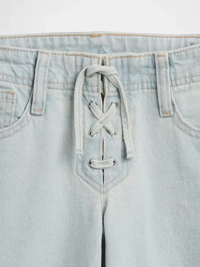 Kinderjeans met lage taille, vetersluiting en relaxte flare