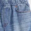 Kinderjeans met losse pasvorm en taps toelopende pijpen