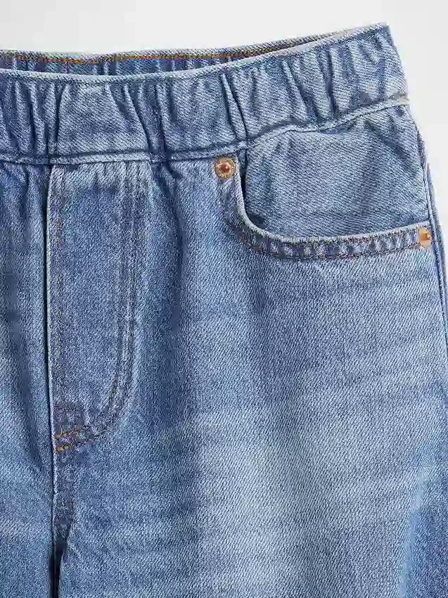 Kinderjeans met losse pasvorm en taps toelopende pijpen