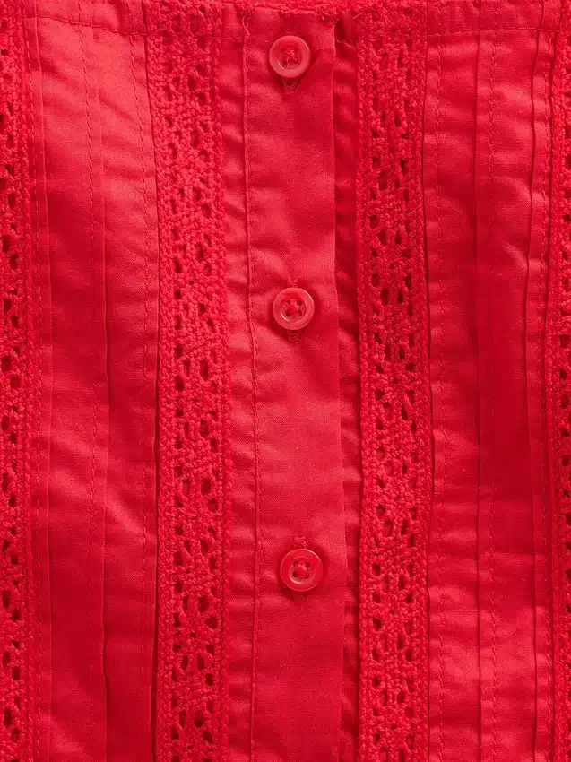 Kinderjurk met fladdermouwtjes en kanten rand