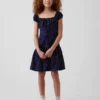 Kinderjurk met stippen en verlaagde taille