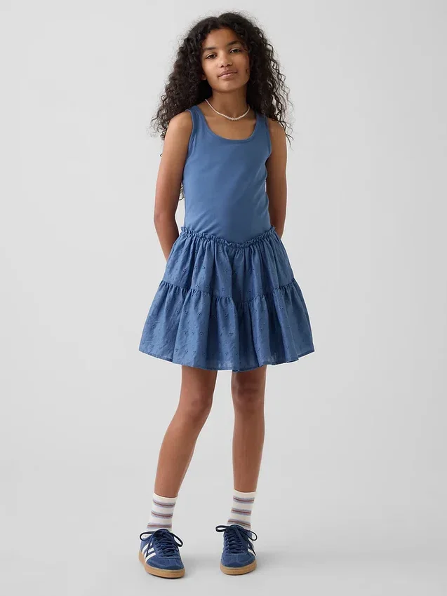 Kinderjurk van gemengde materialen met gelaagde tanktop