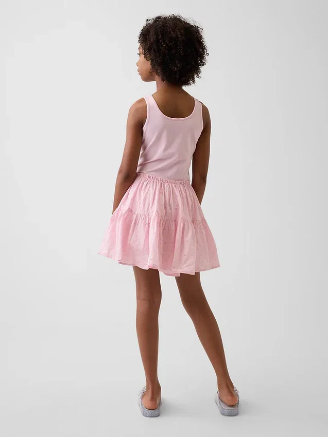 Kinderjurk van gemengde materialen met gelaagde tanktop